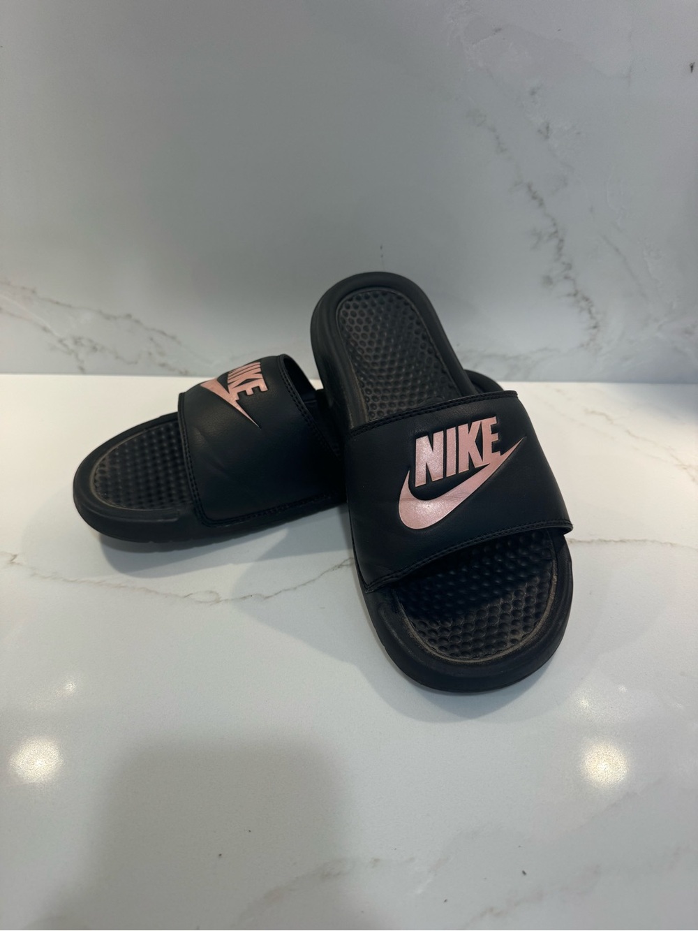 Nike Kids Black Slides with Pink Swoosh